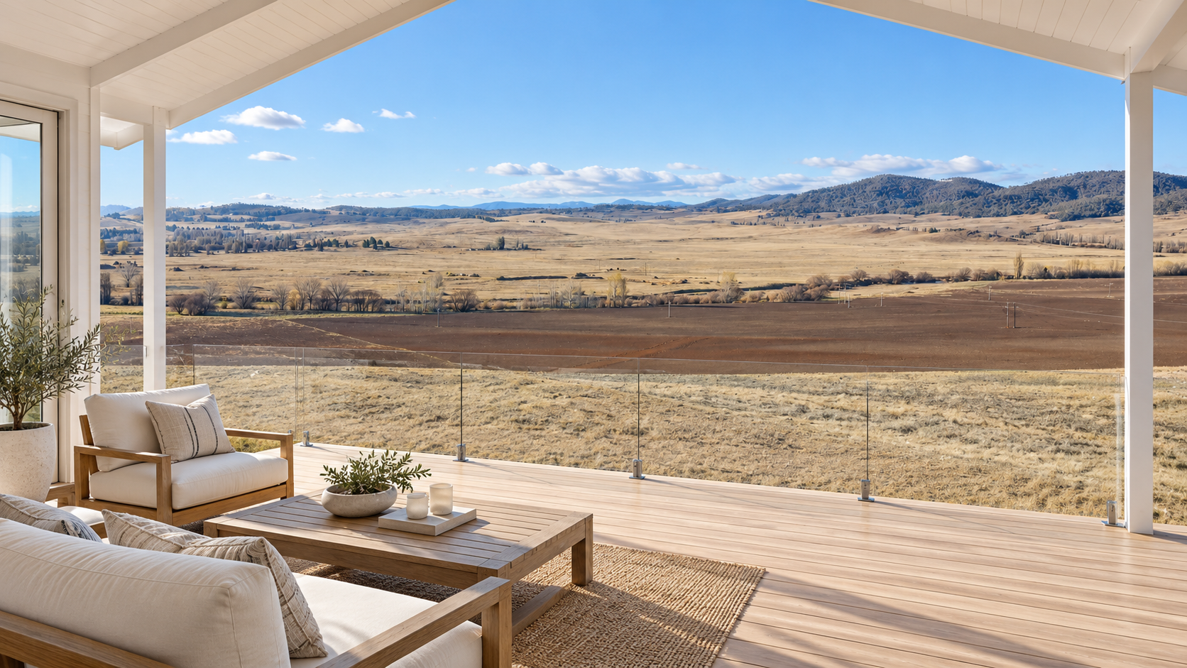 AI-generated concept of a white covered deck overlooking Riverview’s paddocks and hills. The land is vacant; the home and deck are illustrative only.